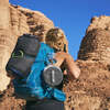 hiking with lantern collapsed and attached to backpack