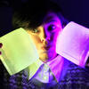 2 colour held against cheeks