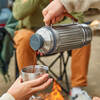 filling cups at camp