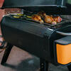 covering grill in use