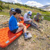 In use by 2 people while eating a meal in the wilderness